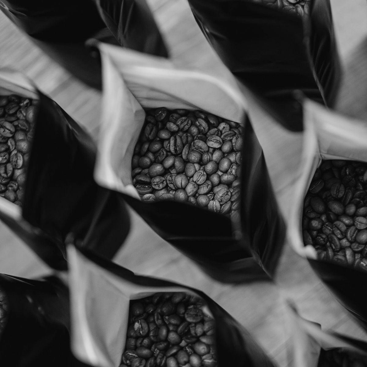 Bagged small-batch roasted coffee prepared for recurring delivery through Pit City's The Schedule.